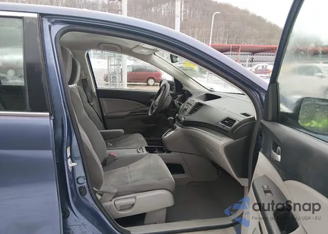 2013 Honda Cr-V Lx z USA, uszkodzony, nr VIN 2HKRM4H31DH642947